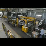 SAVEMA SPA Cyclic Epoxy Resin Line with a production capacity of 30 slabs/hour one face treatment