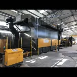 SAVEMA SPA Cyclic Epoxy Resin Line with a production capacity of 30 slabs/hour one face treatment