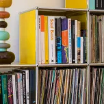 Craig Ford's vinyl and book storage in his modernist home.