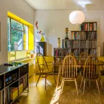 Craig Ford's vinyl and book storage in his modernist home.