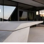 Floating precast concrete table