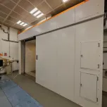 Sliding radiation shielding doors