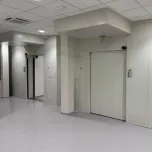 Sliding radiation shielding doors