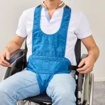 Restraining system to secure the patient in lying and sitting position