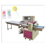 Flow packing machine