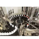 LA - INTERMITTENT MOTION FILLING AND CAPPING MONOBLOC