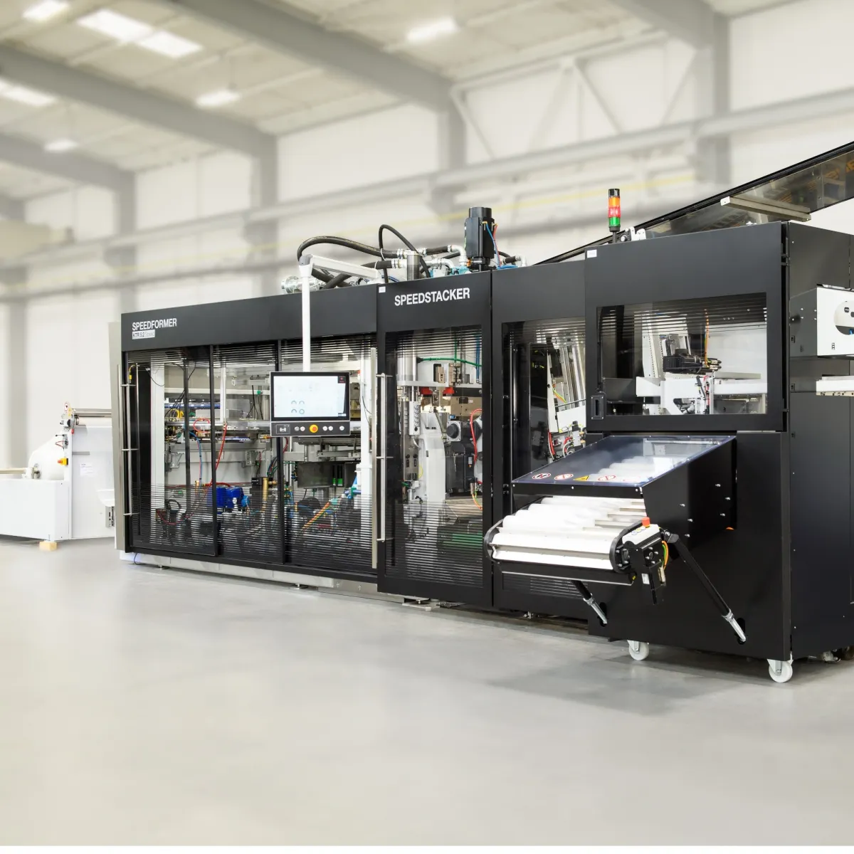 Thermoforming machines for high-end cups