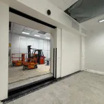 Sliding radiation shielding doors