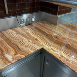 Red onyx worktop for Michelin-starred restaurant Pétrus