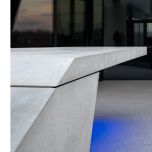 Floating precast concrete table