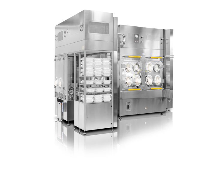 Robotic nest filling machine under Isolator