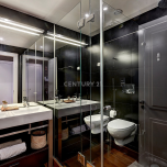 Appartement glamour d'une chambre à coucher dans un immeuble récemment rénové