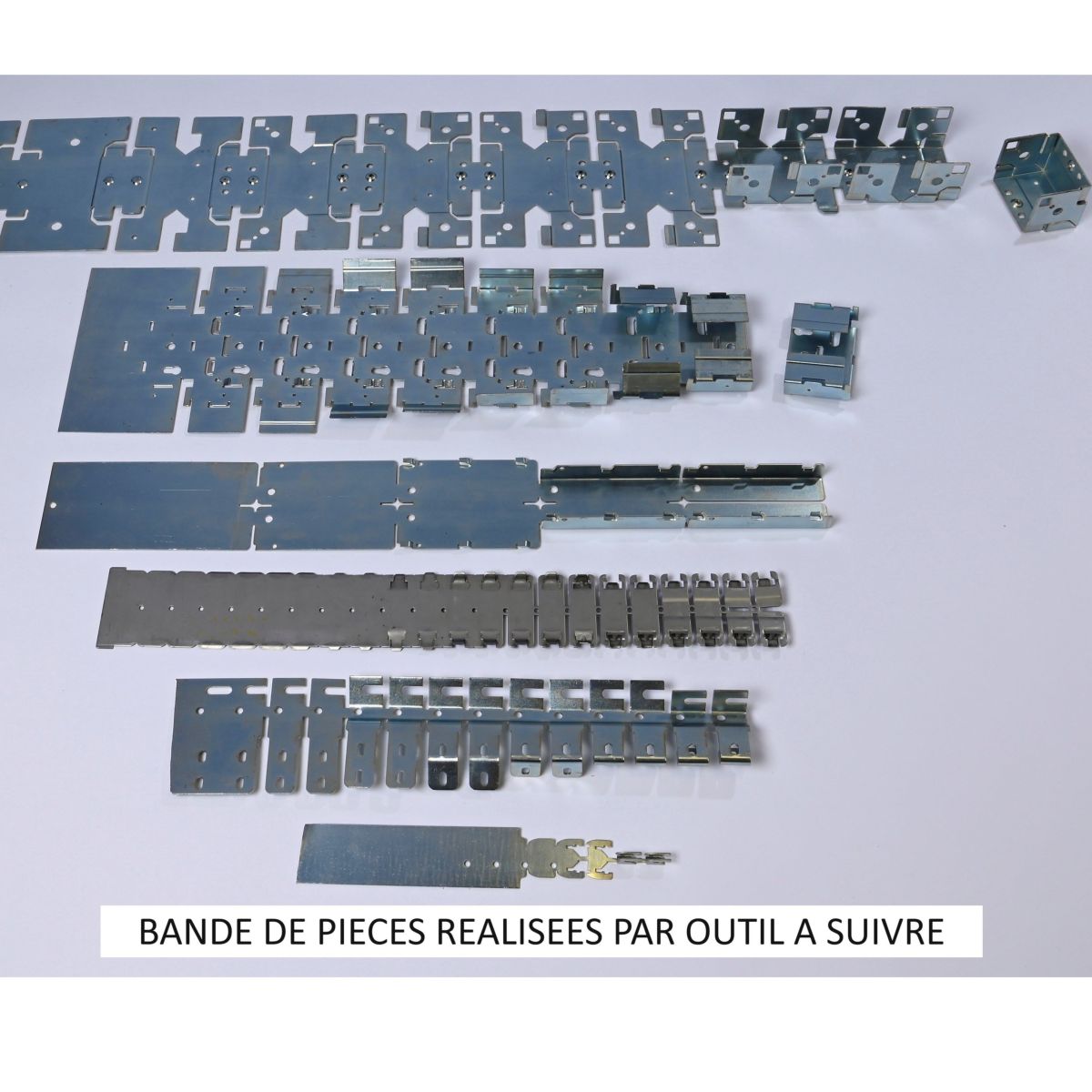 bande de pieces réalisées sur outil à suivre
