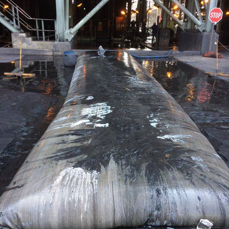 Magnetite recovery from process plant sumps using geotextile dewatering tubes