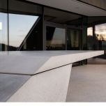 Floating precast concrete table